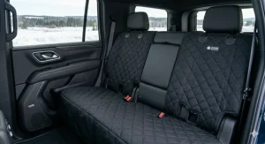 Universal fit waterproof dog car seat cover installed in a large SUV, ideal for Canadian winter road trips with pets.